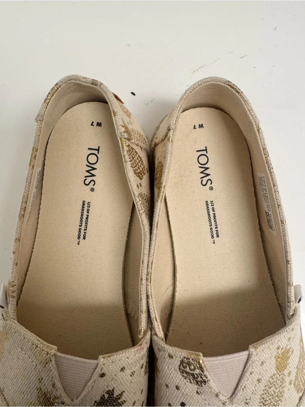 TOMS Cream Espadrille Slip-Ons with Metallic Gold Pineapple Motif